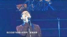 有句歌词是:在这淅沥沥哗啦啦的雨中…这是什么歌啊