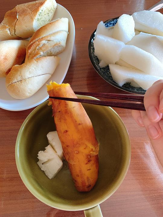 粥的部首是弓还是米?