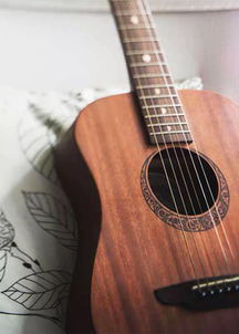 吉他的他是读轻声吗