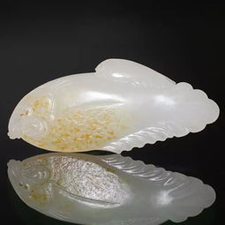 河里挖到一块奇玉,精美颜色分层叠彩,不知道是什么玉?值钱不?