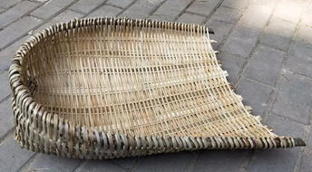 撮箕是什么意思