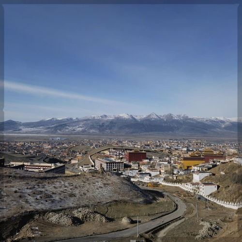 理塘县属于四川哪个市